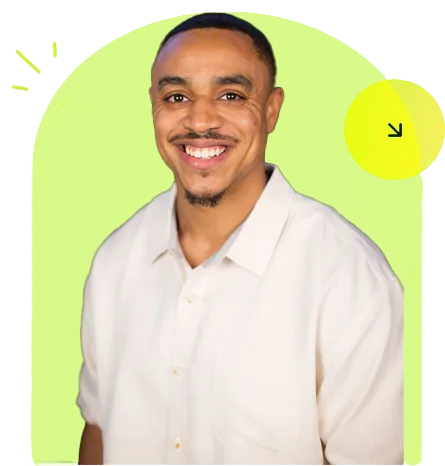 Smiling marketing professional in front of a lime green arch